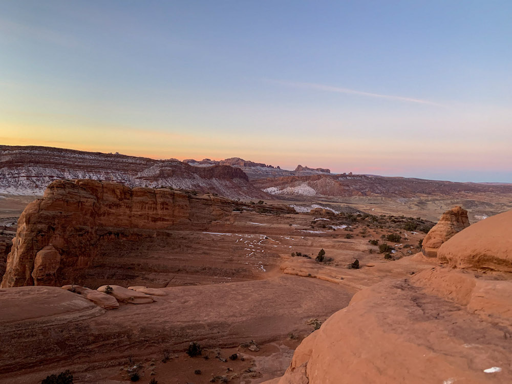 See the sunrise during your Arches National  Park itinerary.