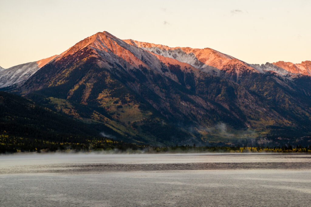 Sunrise at the summit of Mt. Elbert, one of the best things to do in Leadville CO. 