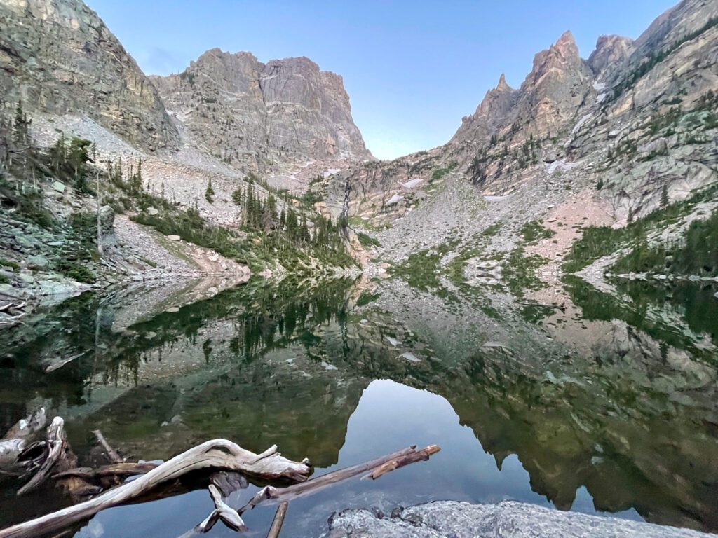View of a lake in Rocky Mountain National Park in the summer. 