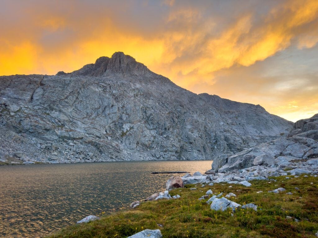The sun setting over a mountain