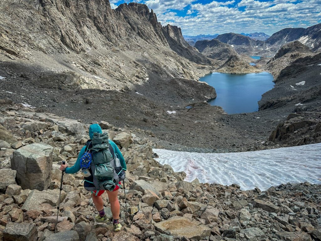 Alpine Lakes Basin in the wind river range is goreous, rugged, and rock-filled valley surrounded by dramatic, rocky peaks.