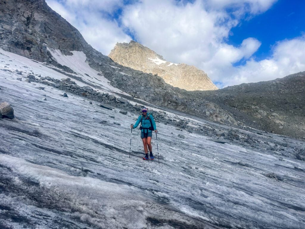 A woman crossing Knifepoint Glacier in the Wind River Range.