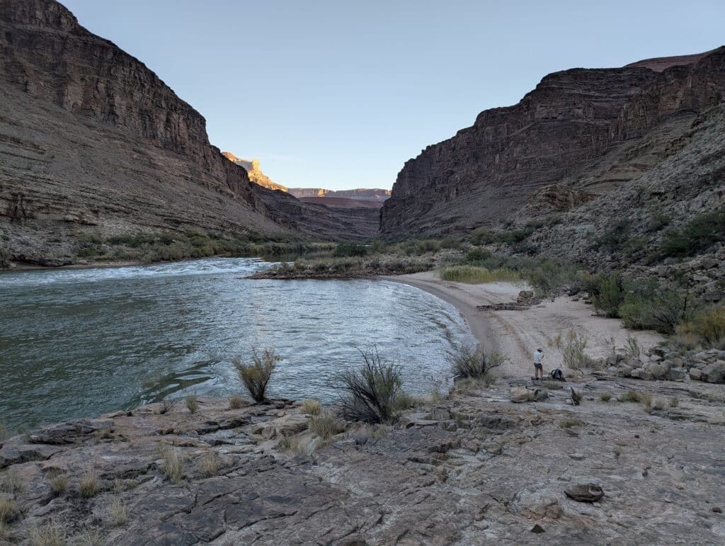 Looking down from a rocky cliff at Escalante Beach